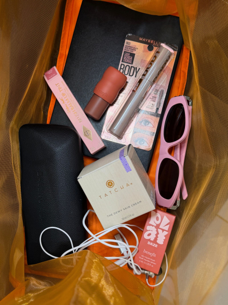 Image may contain Cosmetics Lipstick Accessories and Glasses