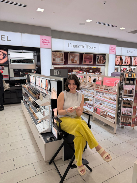 Image may contain Julia Roberts Sara Khoeniha Indoors Adult Person Shop Clothing Footwear Sandal and Sitting