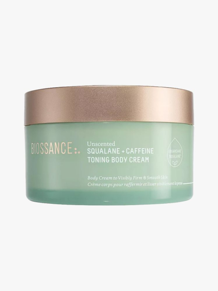 Biossance Squalane + Caffeine Toning Body Cream in branded tub component on a light gray background